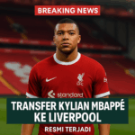 Kylian Mbappé resmi bergabung dengan Liverpool, mengenakan jersey merah di Stadion Anfield.